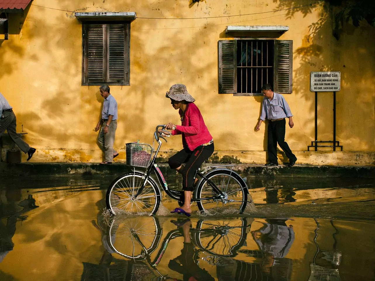 woman cycling after flood